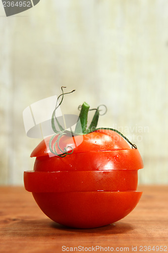 Image of Tomatoes on a Rustic Wood Plank