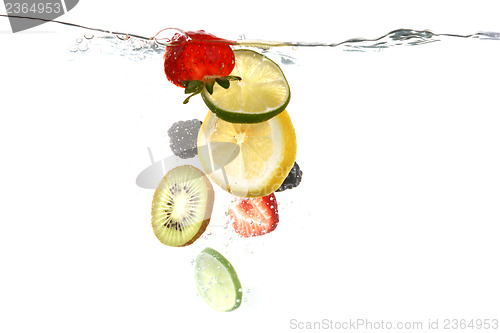 Image of Fruits Falling Into Splashing Clear Water