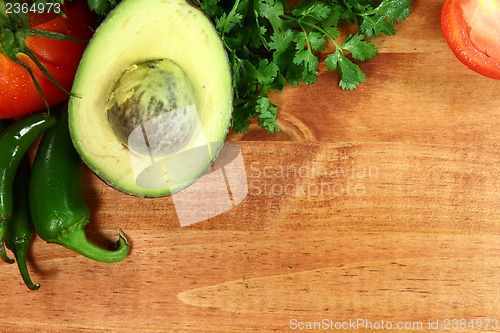 Image of Salsa Ingredients of Avocado, Cilantro, Tomatoes and Peppers