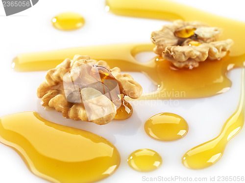 Image of walnuts and maple syrup