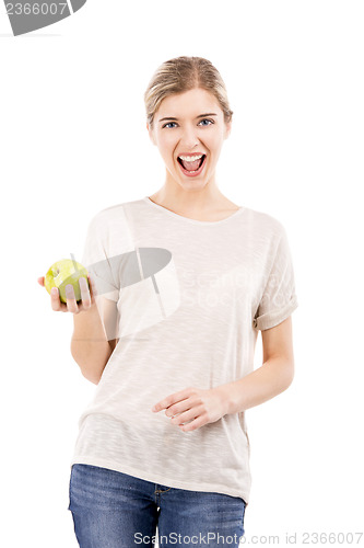 Image of Beautiful woman with a green apple