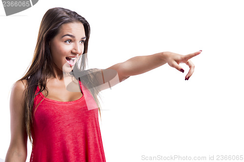 Image of Beautiful woman pointing to something