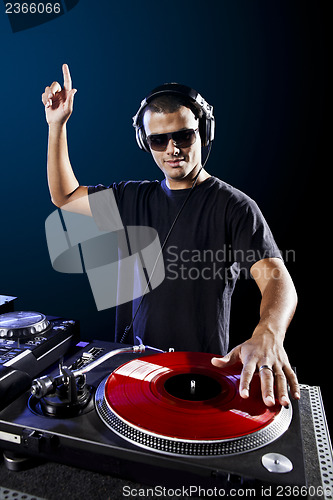 Image of DJ playing music