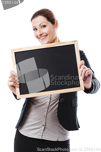 Image of Business woman holding a chalk board