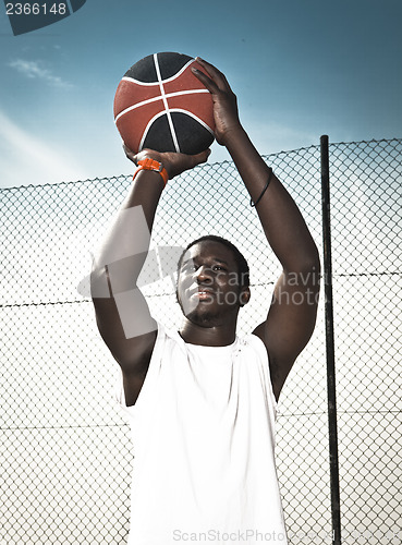 Image of Playing basketball