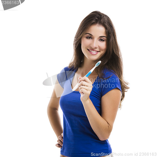 Image of Beautiful woman with a toothbrush