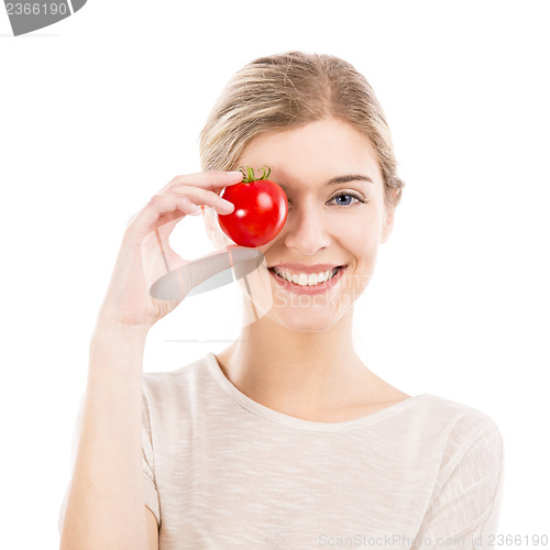 Image of Beautiful woman holding a red chilli pepper