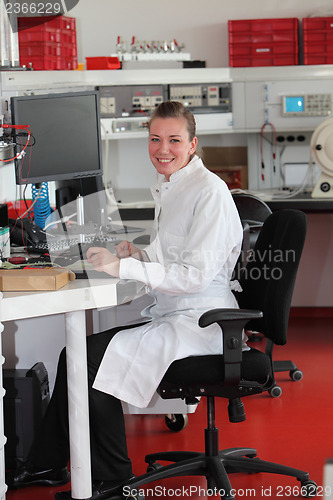 Image of Confident female lab technician