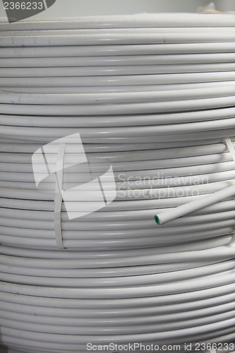 Image of Rolls of electrical cable and conduit