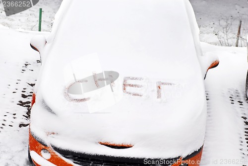 Image of Snow letters written on car