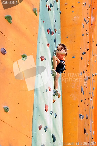 Image of child studying climbing at the climbing centre