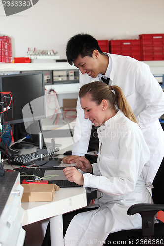 Image of Two lab technologists at work