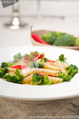 Image of Italian penne pasta with broccoli and chili pepper