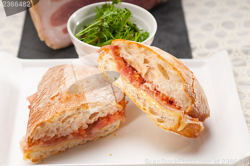 Image of ciabatta panini sandwich with parma ham and tomato