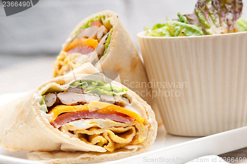 Image of club sandwich pita bread roll