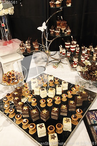 Image of Colorful desserts and pastry served on a wedding party