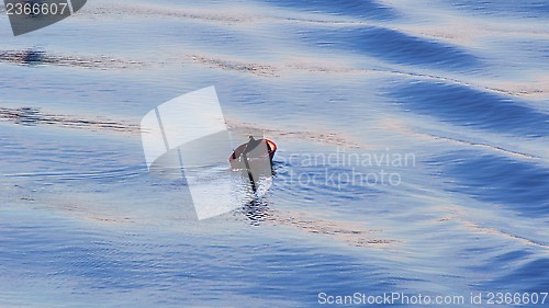 Image of Small boat - big waves 