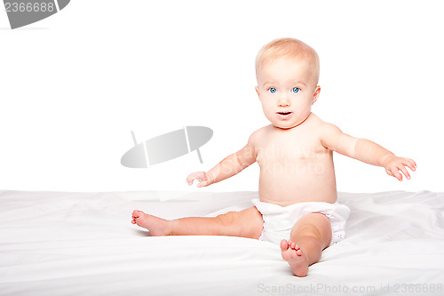 Image of Cute happy sitting baby