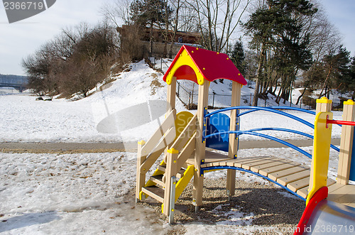 Image of children play house with red roof wooden ladder  