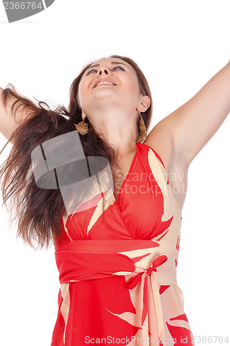 Image of Portrait of a smiling young woman in red dress