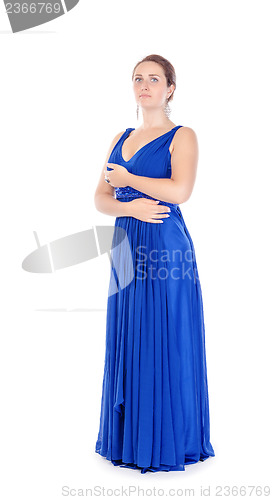 Image of Full lenght portrait of a beautiful young woman in blue dress