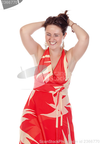 Image of Portrait of a smiling young woman in red dress
