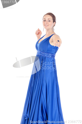 Image of Portrait of a beautiful young woman in blue dress, holds out his