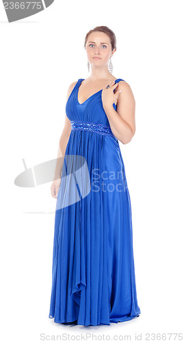 Image of Full lenght portrait of a beautiful young woman in blue dress