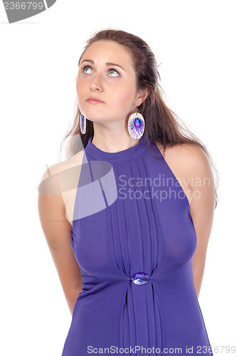 Image of Portrait of a beautiful young woman in blue dress