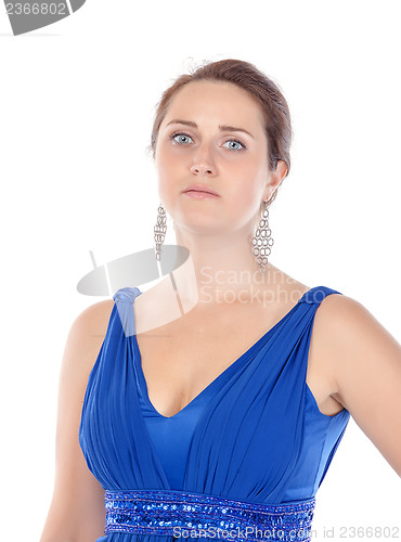 Image of Portrait of a beautiful young woman in blue dress