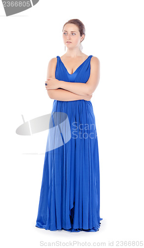 Image of Full lenght portrait of a beautiful young woman in blue dress