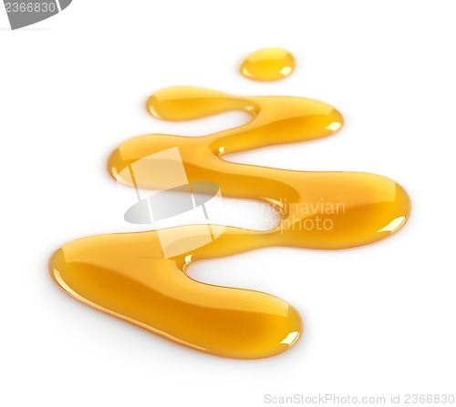 Image of maple syrup on white background