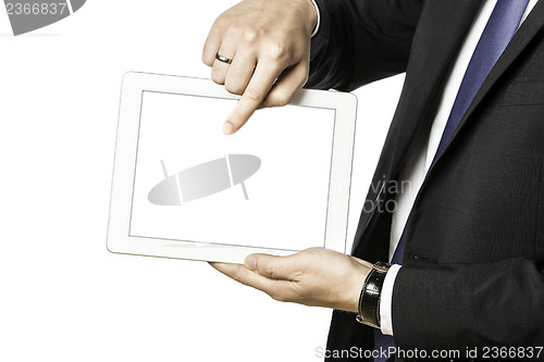 Image of Business man shows something on his tablet computer