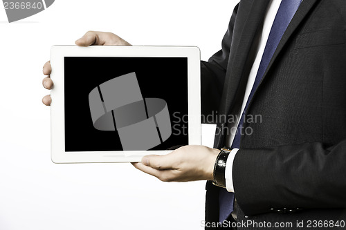 Image of Business man with blank tablet computer