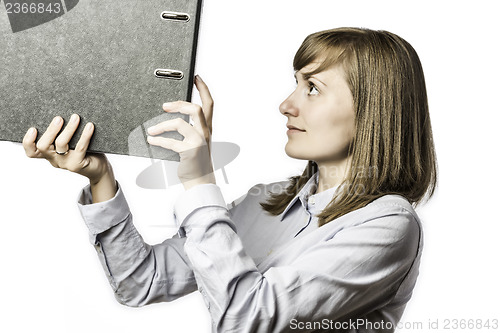 Image of Woman takes a file folder