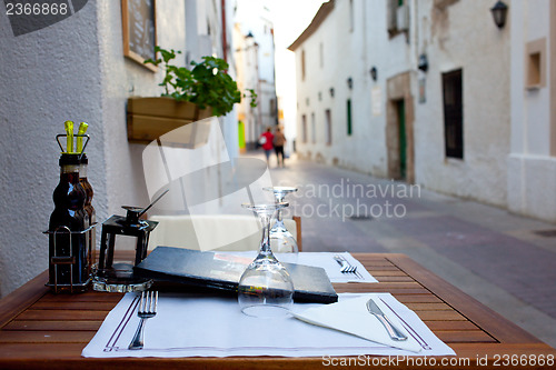 Image of table with wine glasses
