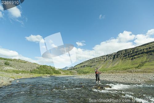 Image of Flyfisherman casting