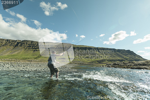 Image of Flyfisherman casting the fly