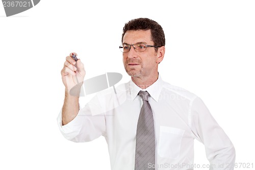 Image of smiling adult businessman write with red pen isolated copyspace