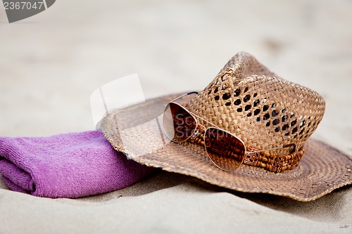 Image of sunprotection objects on the beach in holiday