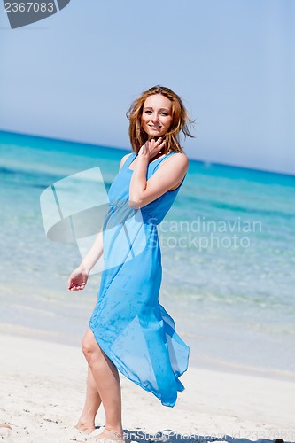 Image of beautful happy woman on the beach lifestyle summertime
