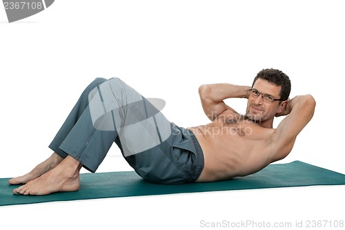 Image of adult smiling man doing workout sport fitness isolated on white