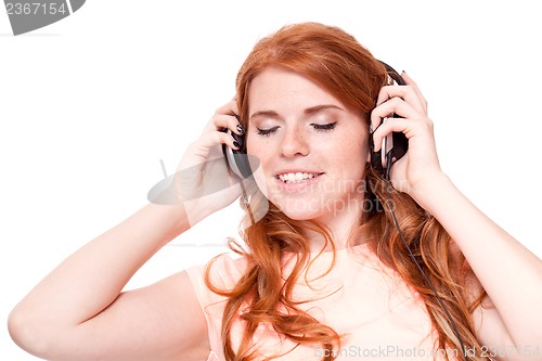 Image of attractive happy woman with headphones listen to music isolated