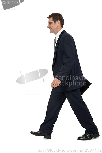 Image of attractive successful adult business man in black suit isolated