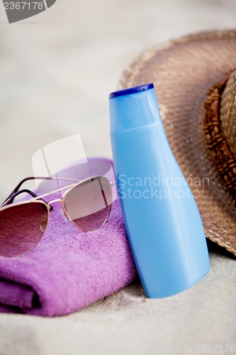 Image of sunprotection objects on the beach in holiday