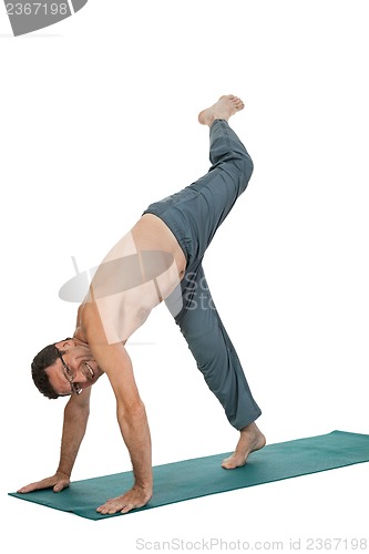 Image of adult smiling man doing workout sport fitness isolated on white