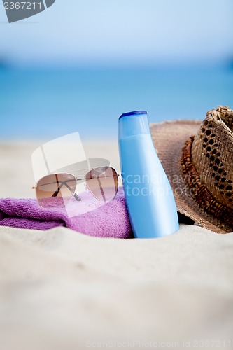 Image of sunprotection objects on the beach in holiday