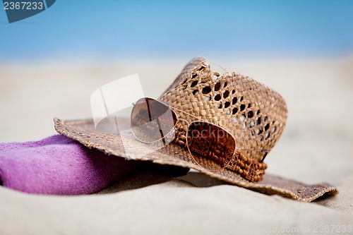 Image of sunprotection objects on the beach in holiday