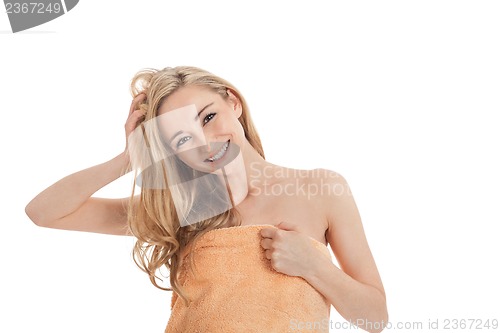 Image of attractive young smiling woman with towel isolated