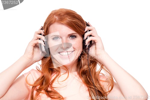 Image of attractive happy woman with headphones listen to music isolated